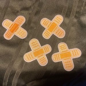 4 pack iron on patches “ band-aides”